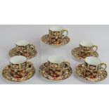 A set of six Royal Crown Derby Imari coffee cups and saucers, date marked for 1906. (12).