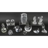 12 glass Figural paperweights including Hummel, Hadeland, Mats Jonasson. Mainly handblown.