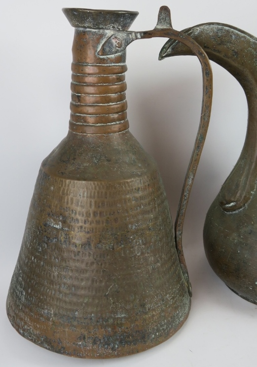 Two large beaten copper Middle Eastern water ewers and a large dallah coffee pot with detachable li - Image 4 of 5