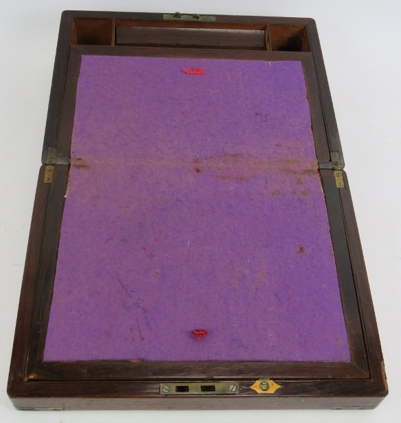 A 19th century brass bound rosewood writing slope with interior fittings. 30cm x 22.5cm x 11cm. - Image 2 of 4