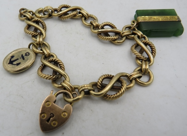 A 9ct yellow gold chunky link bracelet with 9ct gold padlock and 2 other chains. 36.8 grams.