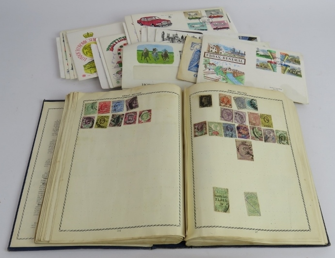 A vintage stamp album and contents including a Penny Black, also a small collection of first day