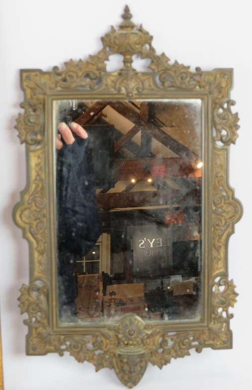 A gilt framed vintage wall mirror with some foxing. 52cm x 20cm, and an ornate Victorian gilt - Image 2 of 4