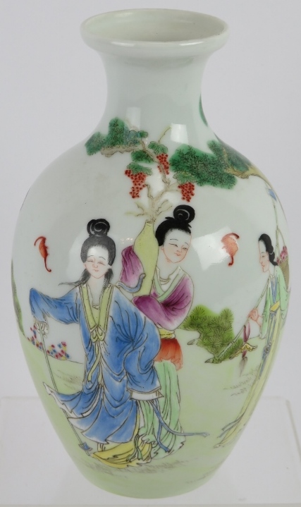 A Chinese porcelain baluster vase with Famille Rose enamelled decoration, red seal mark to base.