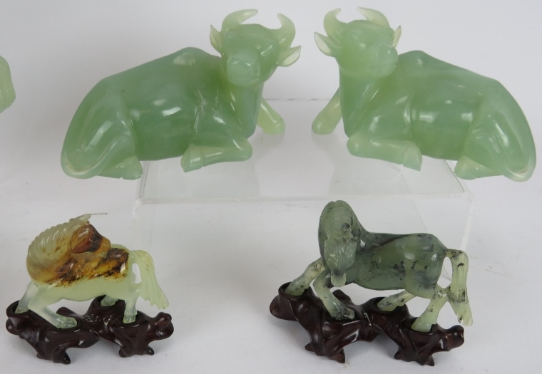 A pair of Chinese carved Jade/Jadeite Dogs of Fo. A similar pair of carved water buffalo and four - Image 2 of 3