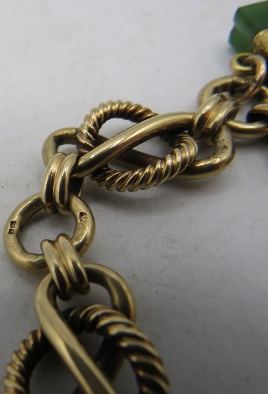 A 9ct yellow gold chunky link bracelet with 9ct gold padlock and 2 other chains. 36.8 grams. - Image 4 of 4