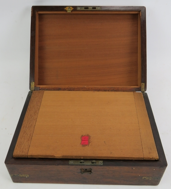 A 19th century brass bound rosewood writing slope with interior fittings. 30cm x 22.5cm x 11cm. - Image 4 of 4