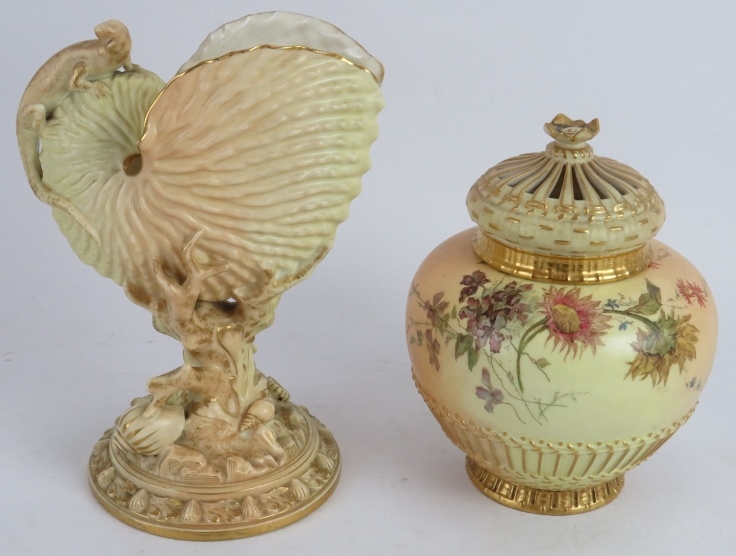 A Royal Worcester blush nautilus shell with lizard, date marked 1895, and a Royal Worcester