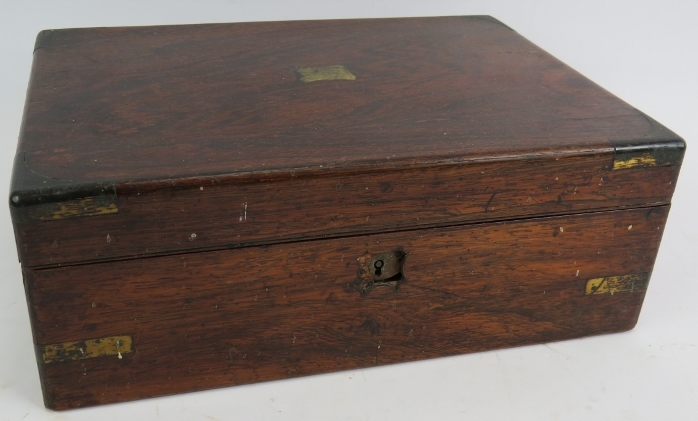 A 19th century brass bound rosewood writing slope with interior fittings. 30cm x 22.5cm x 11cm.