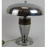An Art Deco chrome and copper desk lamp with mushroom shade and copper bladed baluster. c1930s.