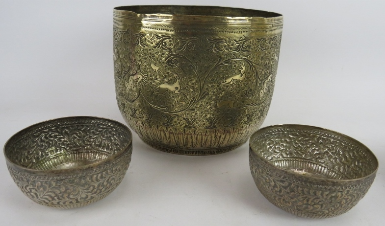 A finely decorated Indo-Persian brass Jardinière, two repousséd Eastern bowls, a turned brass - Image 2 of 4