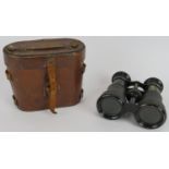 A Pair of WWI era binoculars marked 'War Office 812X', with fitted case. Condition report: Age
