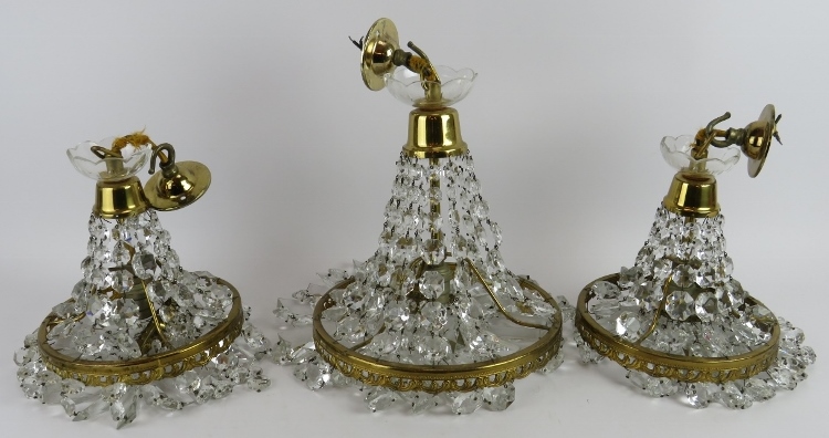 Three cut crystal glass and gilt brass chandeliers, one 52cm drop, 25cm diameter and two 45cm