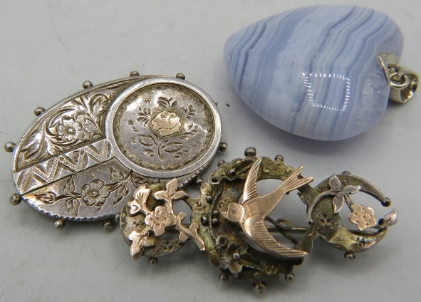 2 silver brooches. Chester 1896 and Birmingham 1885 and a heavy heart shaped Chalcedony pendant with