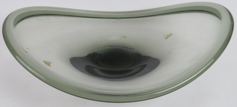 A 1960s Danish smoked studio glass bowl of elliptical form signed by Per Lutken, Holmegaard, 1961.