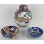 Two antique Japanese porcelain bowls and a 20th century enamelled Japanese covered jar with seal