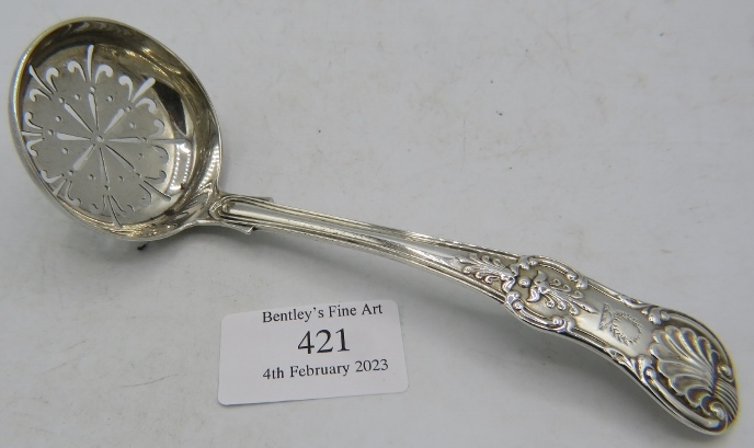 A Victorian silver Kings pattern sifter spoon. Newcastle 1852. 1.3 troy oz/40 grams. Condition