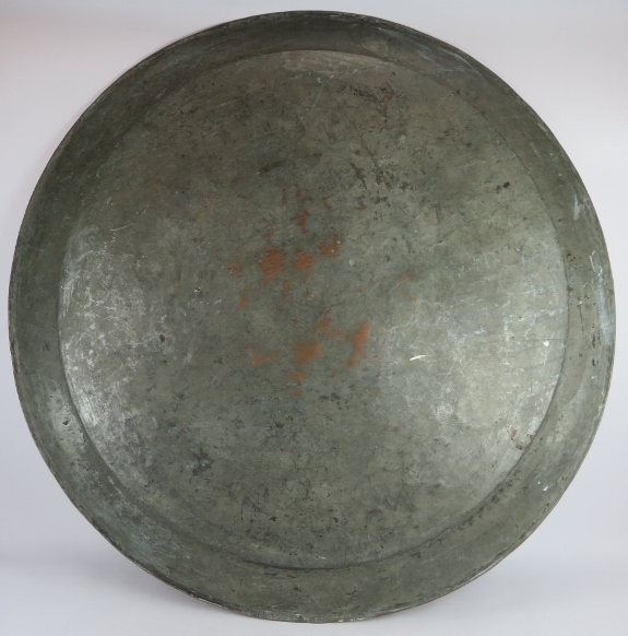 A very large antique Middle Eastern copper charger. 108 cm diameter, with remnants of silver over - Image 3 of 3