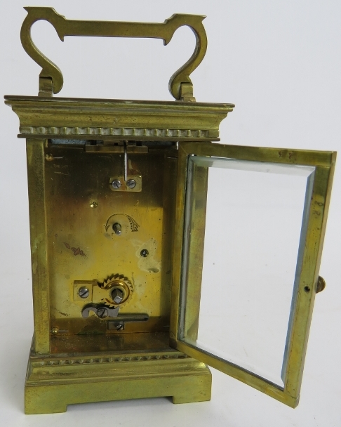 An early 20th century brass cased carriage clock, 12cm high. Condition report: White enamel dial - Image 2 of 3