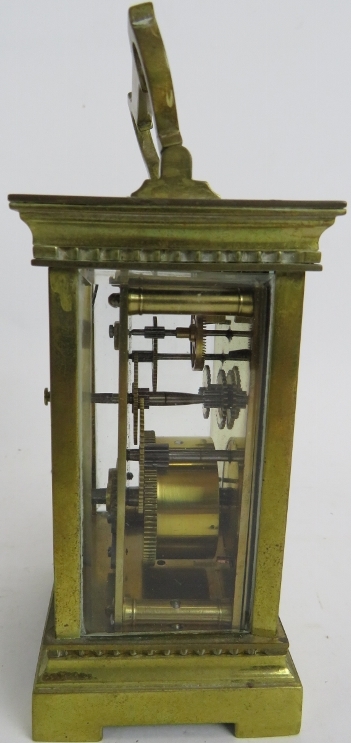 An early 20th century brass cased carriage clock, 12cm high. Condition report: White enamel dial - Image 3 of 3