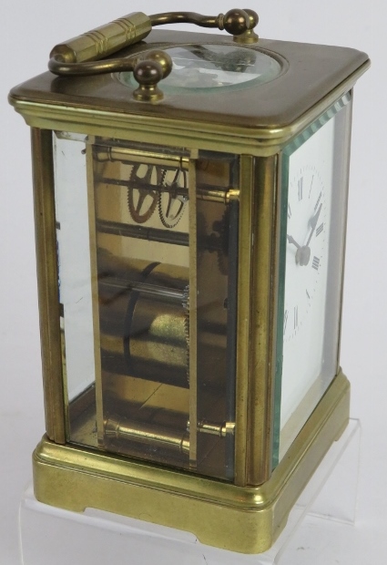 A brass cased 8 day carriage clock with white enamel dial. Overall height: 16cm. Key present. - Image 2 of 3