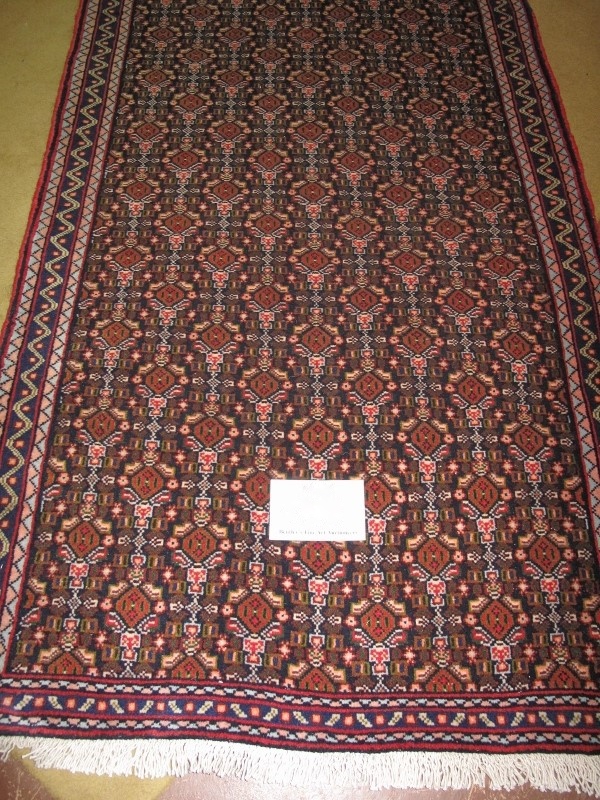 North West Persian Senneh runner, repeat central pattern on blue field. 260cm x 80cm.