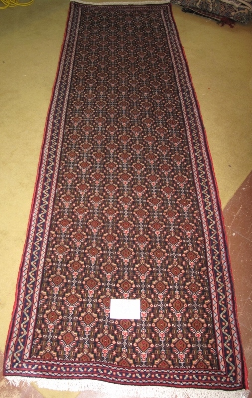 North West Persian Senneh runner, repeat central pattern on blue field. 260cm x 80cm. - Image 2 of 2