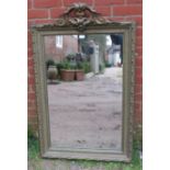 An antique French rectangular wall mirror in an intricately moulded gesso frame featuring acanthus