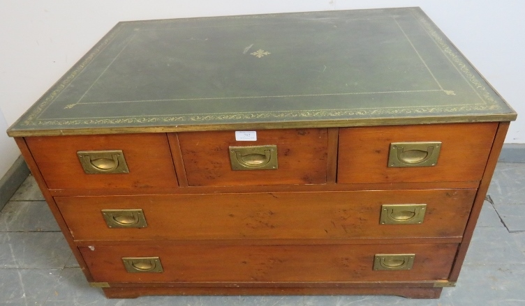 A vintage yew wood campaign style chest with inset green leather gilt tooled surface, housing