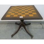 A vintage mahogany square chess table, the top with satin walnut and oak chessboard inlay, with