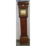 An early 18th century oak-cased longcase clock of small proportions, the plain hood with stepped