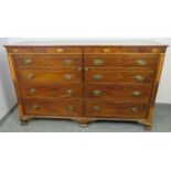 A George III mahogany sideboard featuring marquetry inlay depicting oak leaves and acorns, flanked