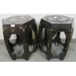 A near pair of vintage Chinese black lacquer barrel stools, the tops with mother of pearl inlay