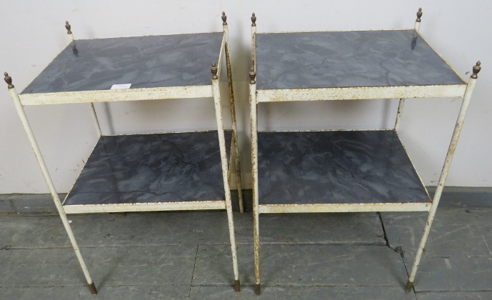 A pair of vintage two-tier side tables with brass finials and blue marble effect shelves, on steel