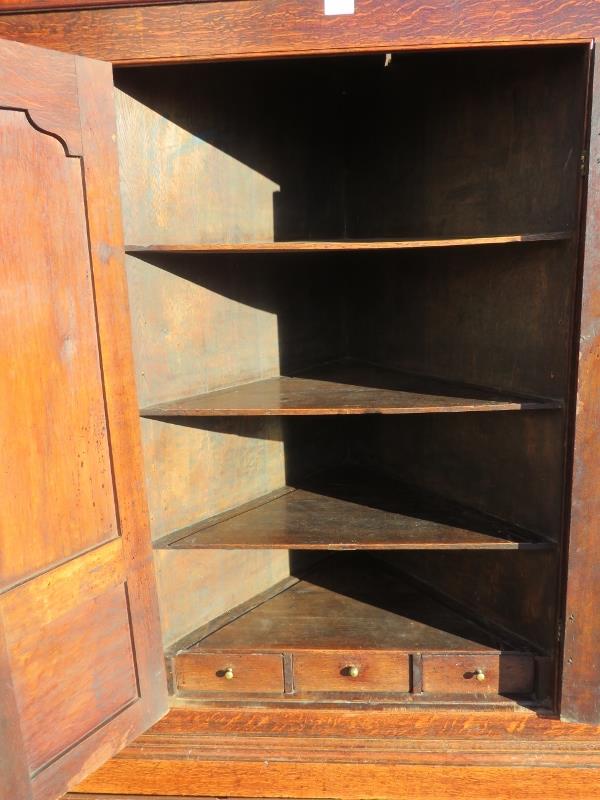 A good 18th century Welsh oak livery cupboard, the inlaid cornice featuring a central butterfly, - Image 5 of 8