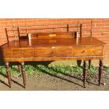 A 19th century mahogany and rosewood sideboard, crossbanded and strung with ebony, brass mounted and