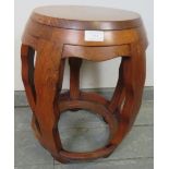 A vintage Chinese huanghuali wood barrel stool, the top with fine silver inlay depicting a maiden in