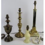 Four vintage lamp vases including a fine onyx based Corinthian column, a brass candlestick, brass