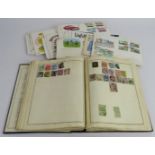 A vintage stamp album and contents including a Penny Black, also a small collection of first day