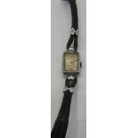 A Le Coultre Co. Vintage wristwatch on leather strap 461428. Condition report: Some age related