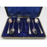 A set of six silver teaspoons with sugar tongs. Birmingham 1917 and 1918. 2.5 troy oz/77 grams.