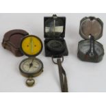 A late 19th century Major Legh's luminous compass with leather case, a WWII period magnetic marching