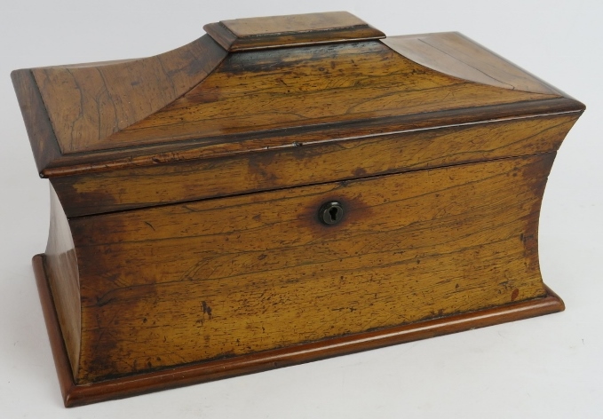 A 19th century Rosewood Sarcophagus shaped tea caddy. Partially internally fitted. Length: 34.5cm,