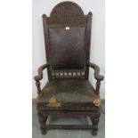 An unusual 19th century mahogany height adjustable throne chair, the cornice with relief carved