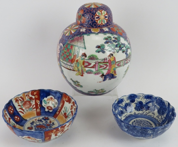 Two antique Japanese porcelain bowls and a 20th century enamelled Japanese covered jar with seal