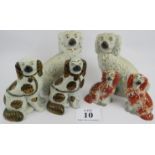 Two pairs of Staffordshire dogs and 2 two same. 19th century pair painted red, 16cm height,