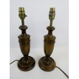 A pair of vintage turned oak table lamps, 37cm high. Condition report: Not tested.