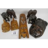 African hardwood carvings, 2 pairs of elephants, and 4 face masks. Elephants 18cm height