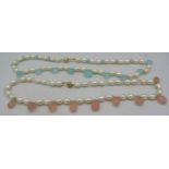 A pearl & chalcedony briolette necklace with yellow metal spacers and a 375 marked ball clasp and