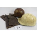 Two mid 20th century motorcycle helmets and a pair of motorcycle gloves, A/F. Condition report: